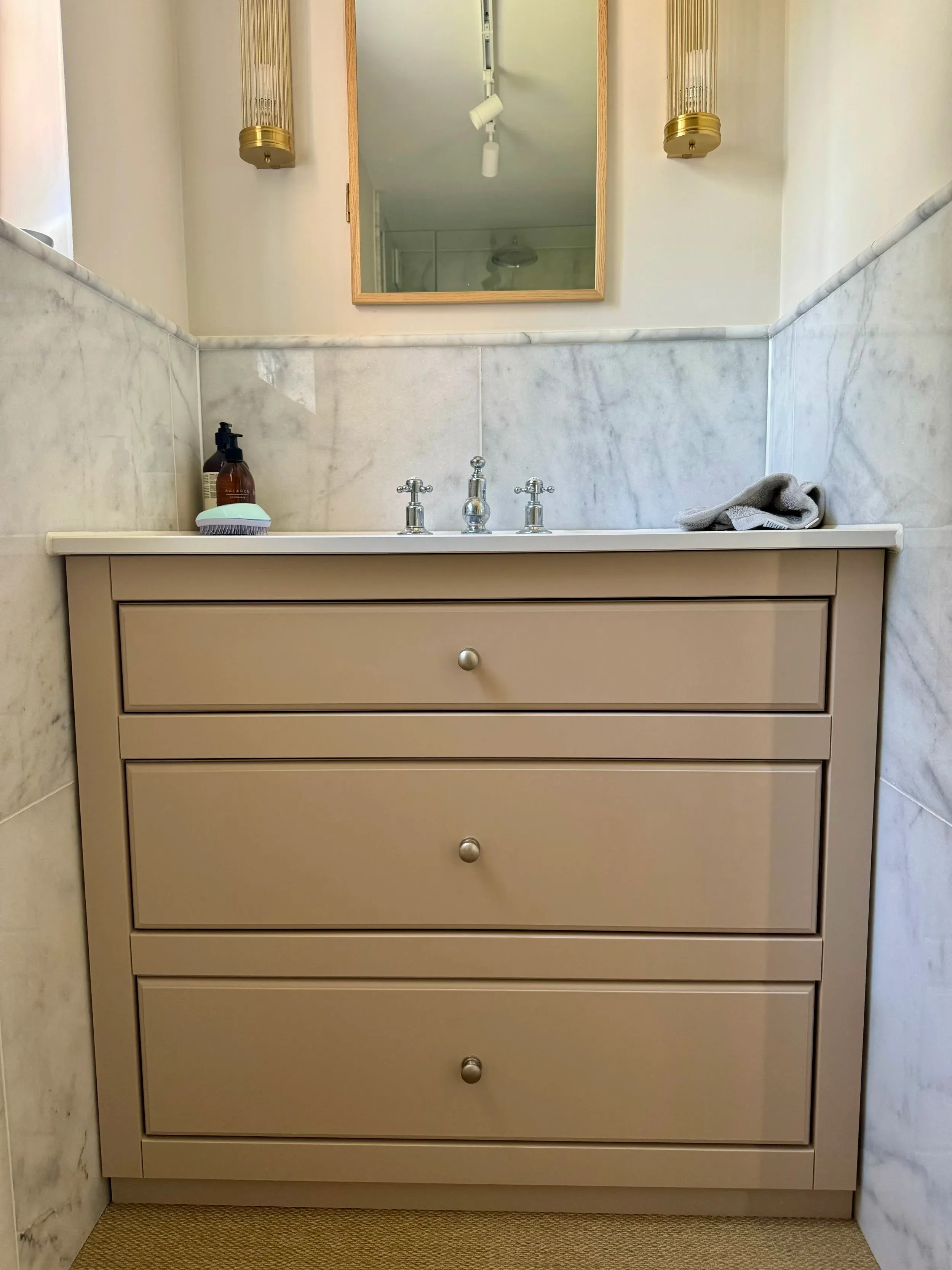 Bespoke vanity unit with marble surround